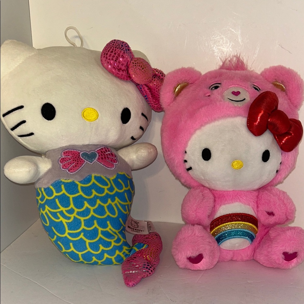 Hello kitty plush 10”H lot of 2 you get what is pictured gently played with